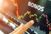 Calma en el mercado: el dólar cede, crecen bonos y acciones